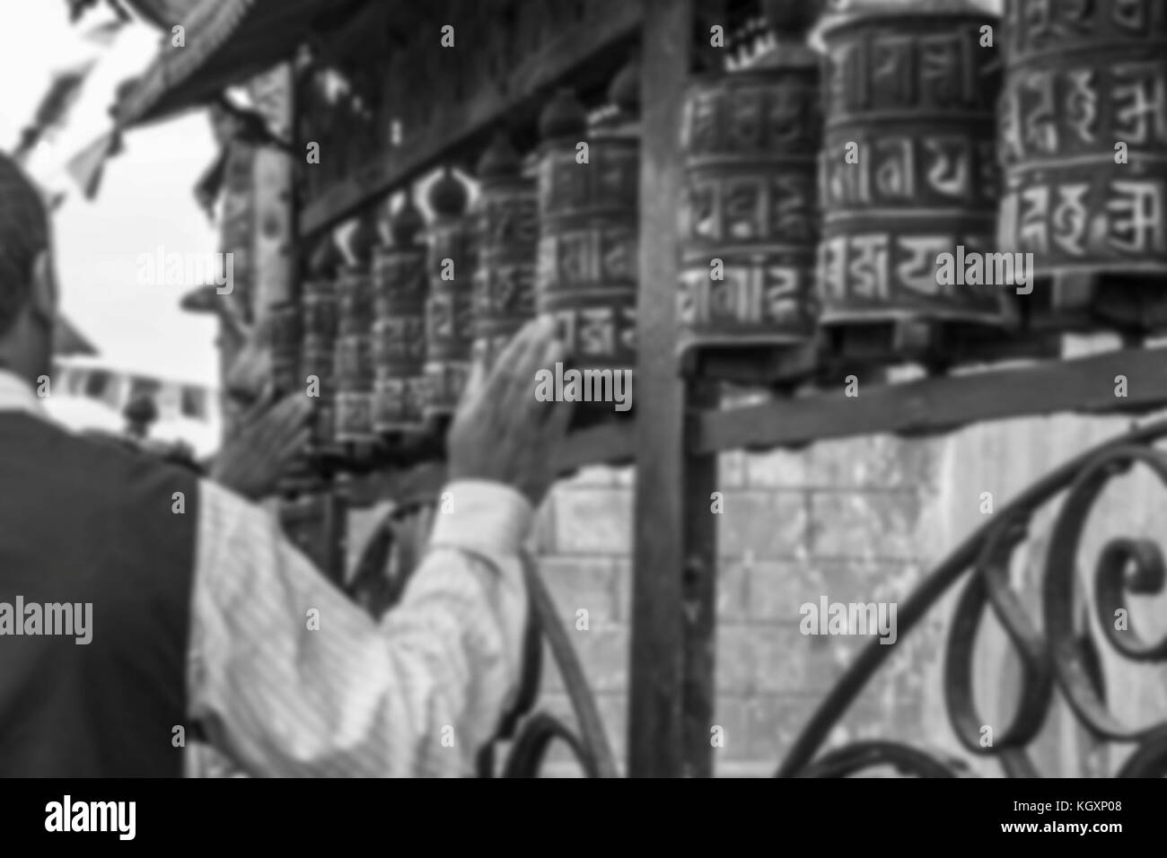 Arrière-plan flou de l'homme prières roulement roues Banque D'Images