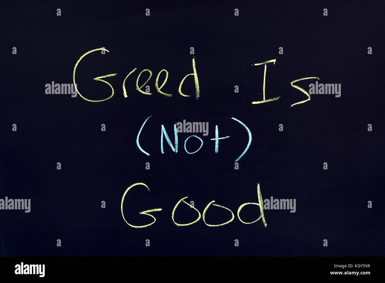 L'expression cupidité n'est pas bonne sur un fond de couleur sombre. Banque D'Images