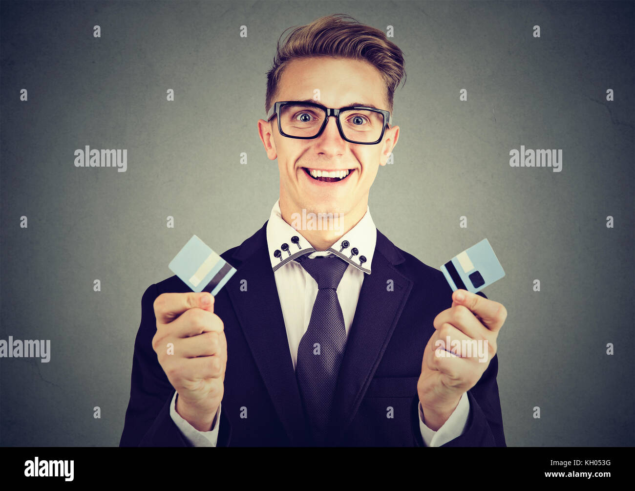 Professionnels de la dette gratuitement business man holding a coupé en deux pièces Banque D'Images