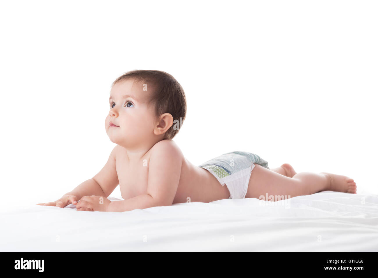 Portrait d'une fille de bébé souriant sur fond blanc Banque D'Images