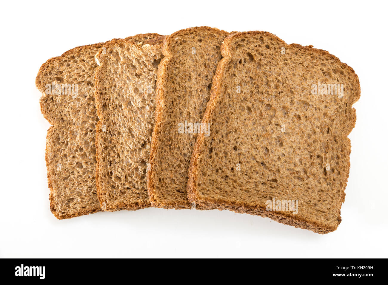 Tranches de pain de grains entiers, sur fond blanc. Banque D'Images