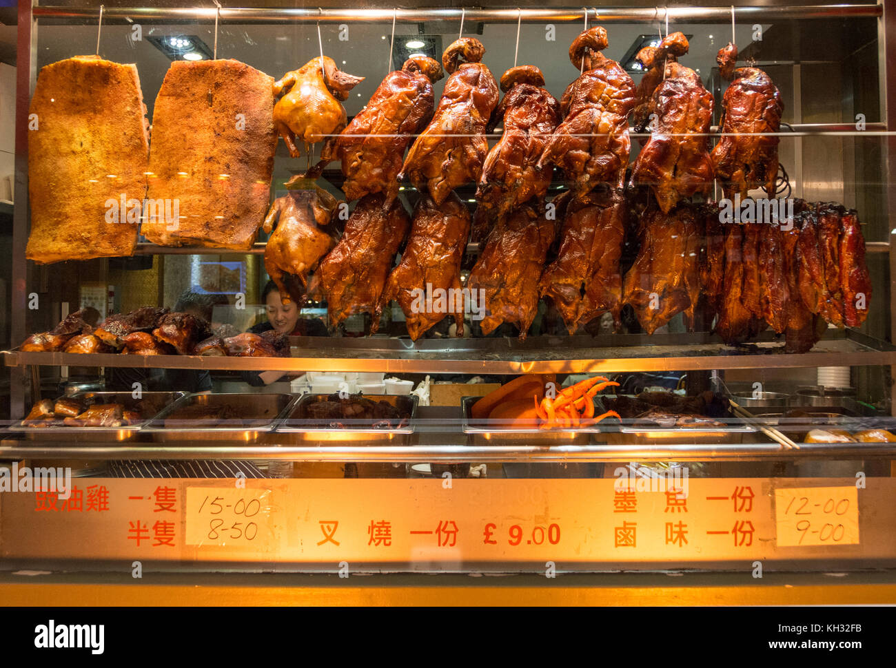 Canard croustillant chinois aromatique exposé à China Town, Soho, Londres, Angleterre, Royaume-Uni. Banque D'Images