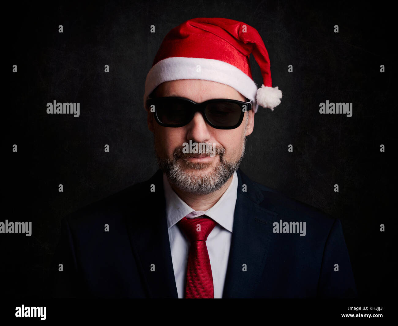 Businessman à Noël sur fond noir Banque D'Images