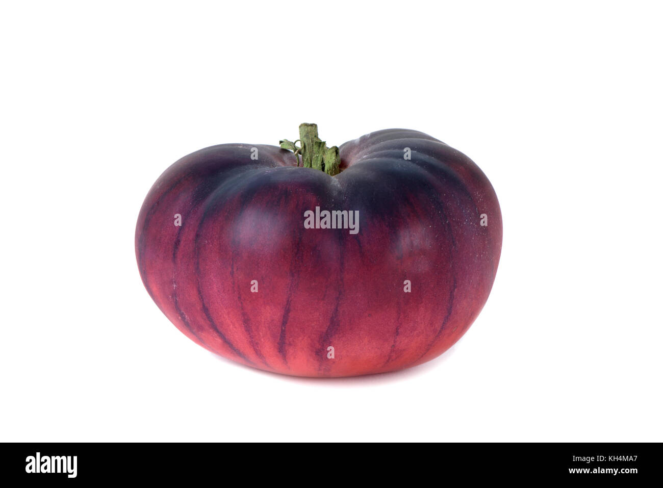 Libre de tomates bleu sur fond blanc Banque D'Images