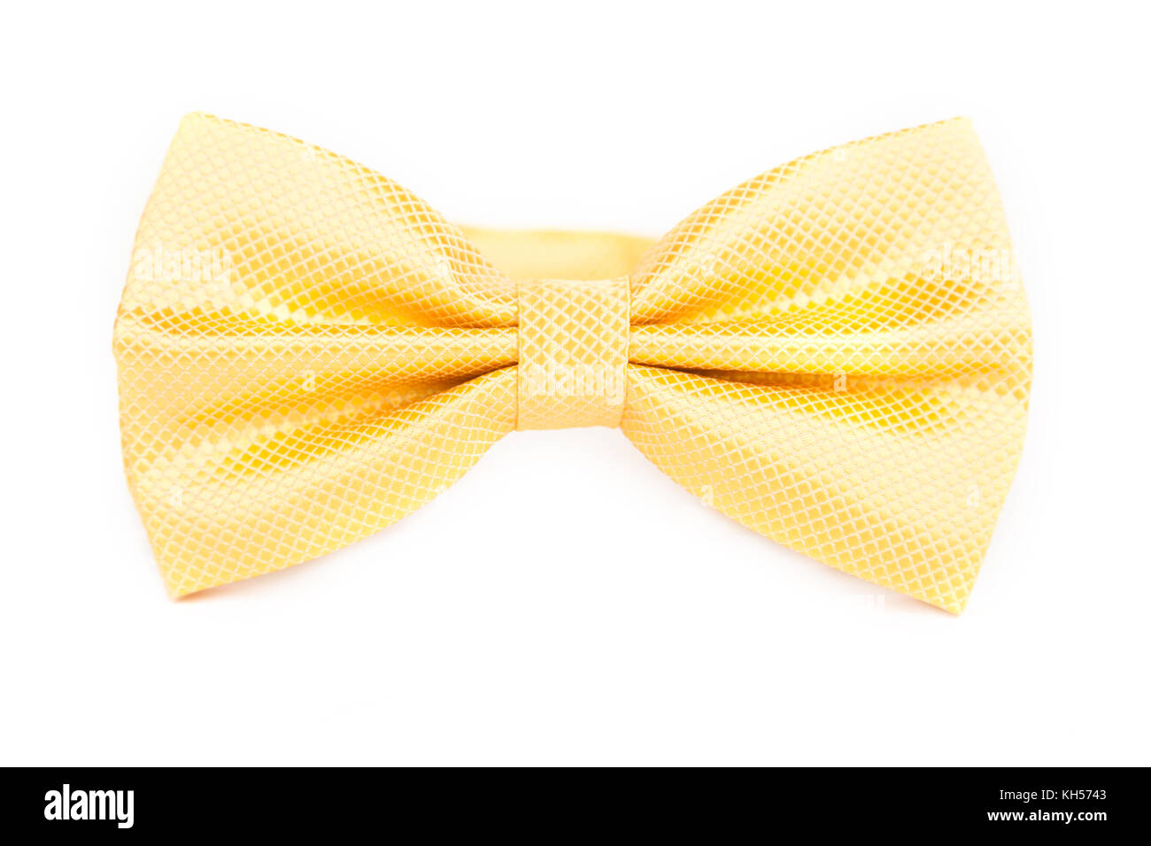 Bow tie jaune vif in front of white background Banque D'Images