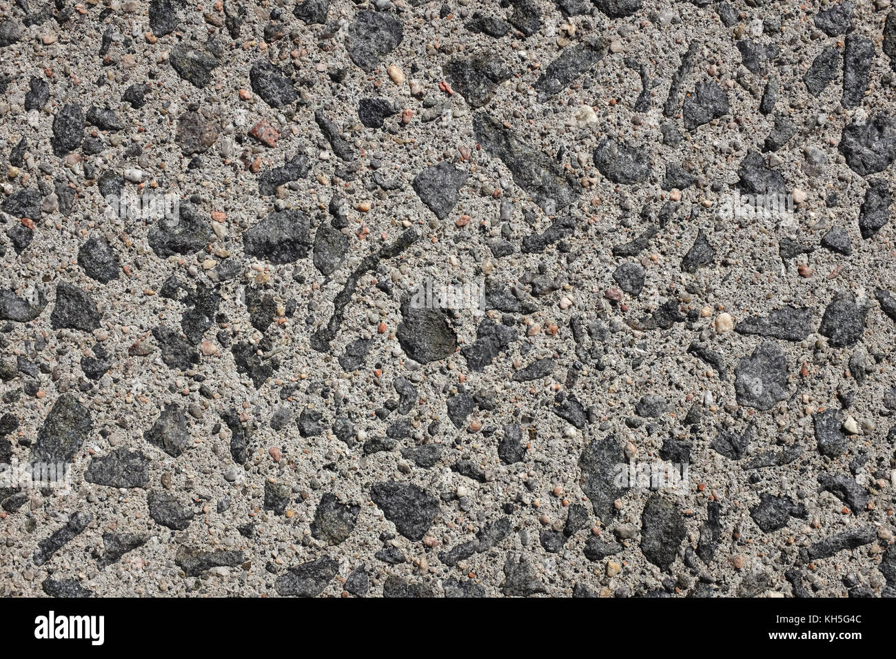 Agrégat de pavage en béton, avec de petites pierres et le sable comme texture de fond abstrait Banque D'Images