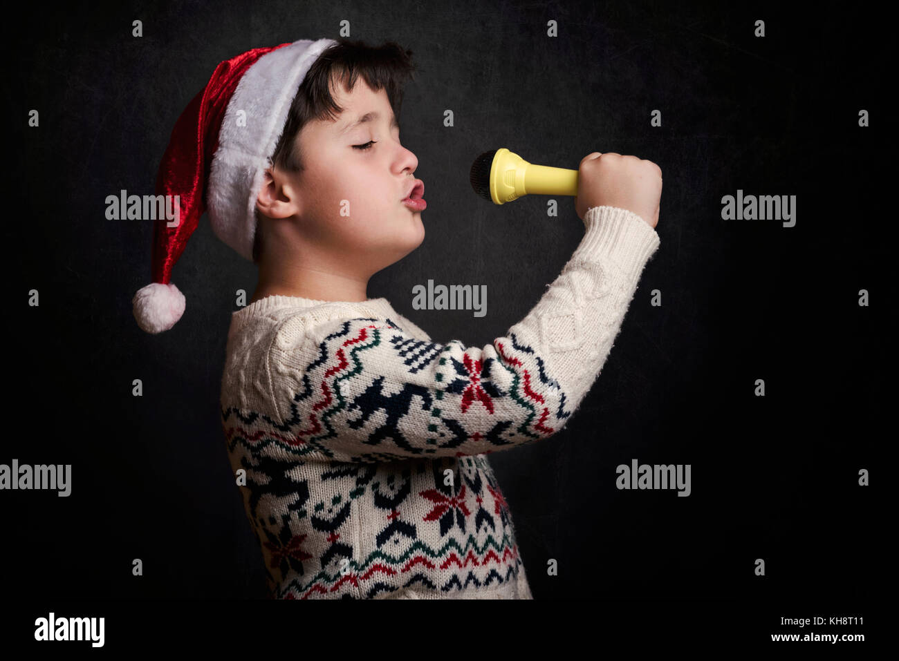 Le chant de l'enfant de noël à Noël Banque D'Images