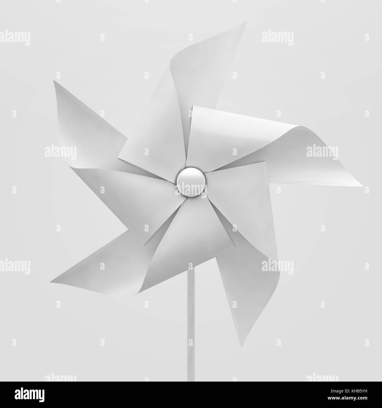 Un jouet ordinaire moulin avec roue à ailettes de couleur blanche sur un bâton sur un fond isolé - 3D render Banque D'Images