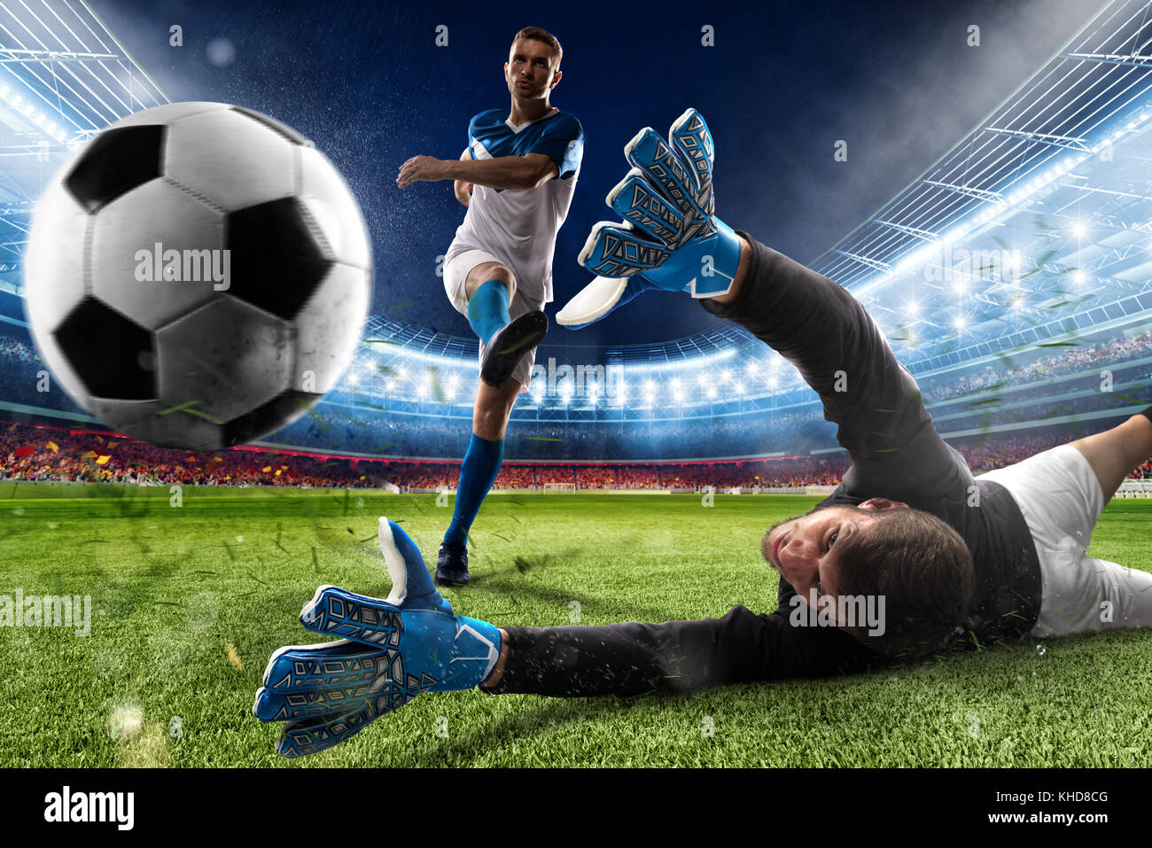 Gardien de la balle donne un coup dans le stade Banque D'Images