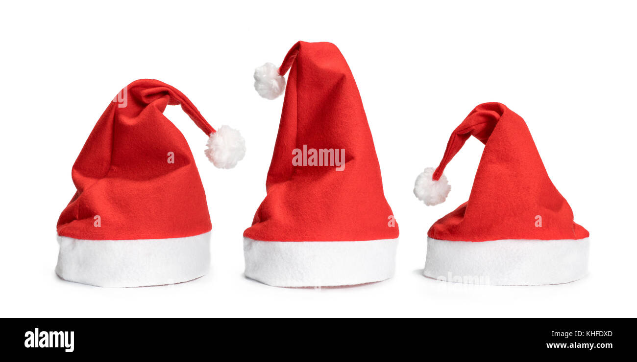 Red christmas hats. isolé sur blanc, side view Banque D'Images