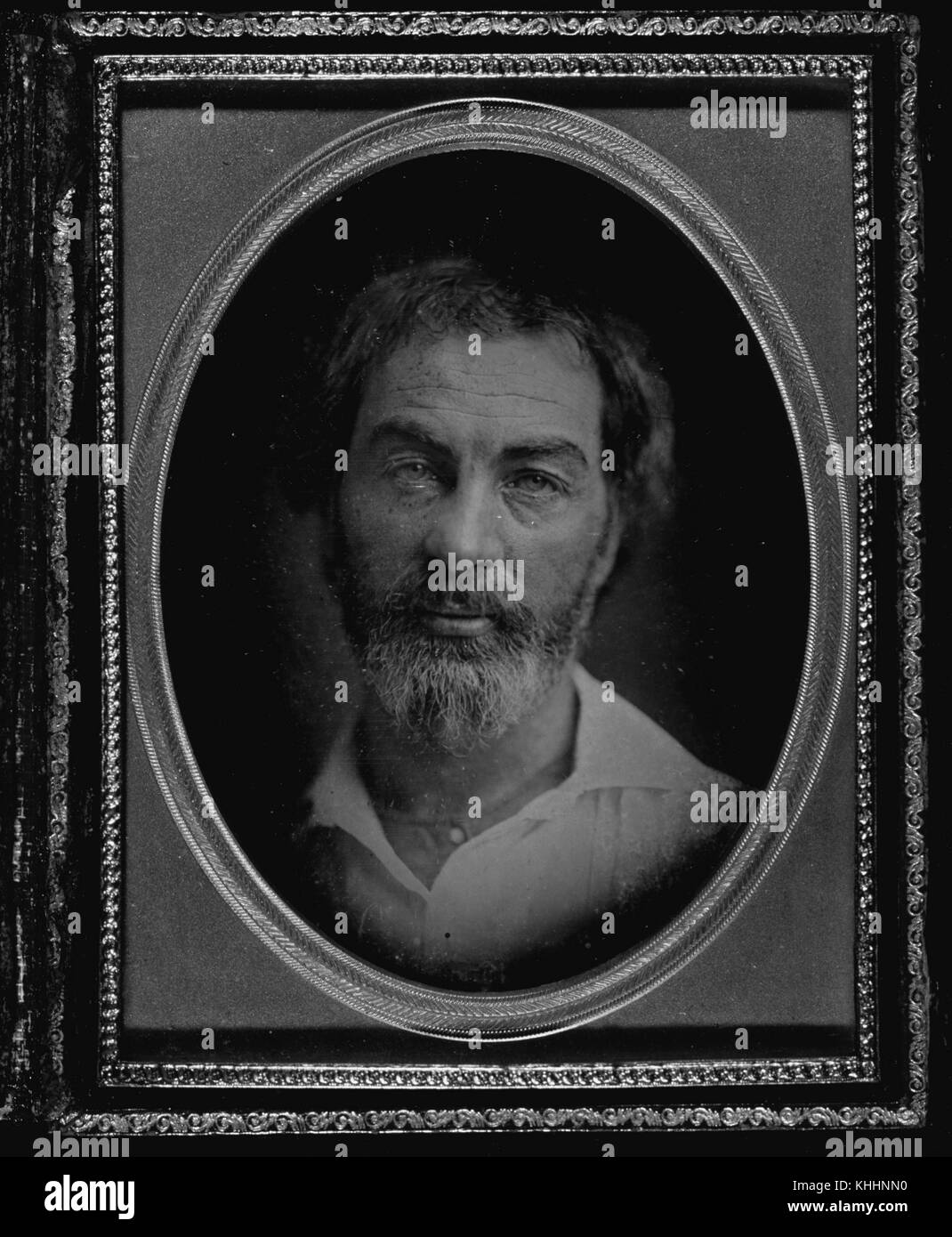 Portrait ovale et encadré de style daguerréotype de Walt Whitman, poète, essayiste et journaliste américain, 1853. De la bibliothèque publique de New York. Banque D'Images