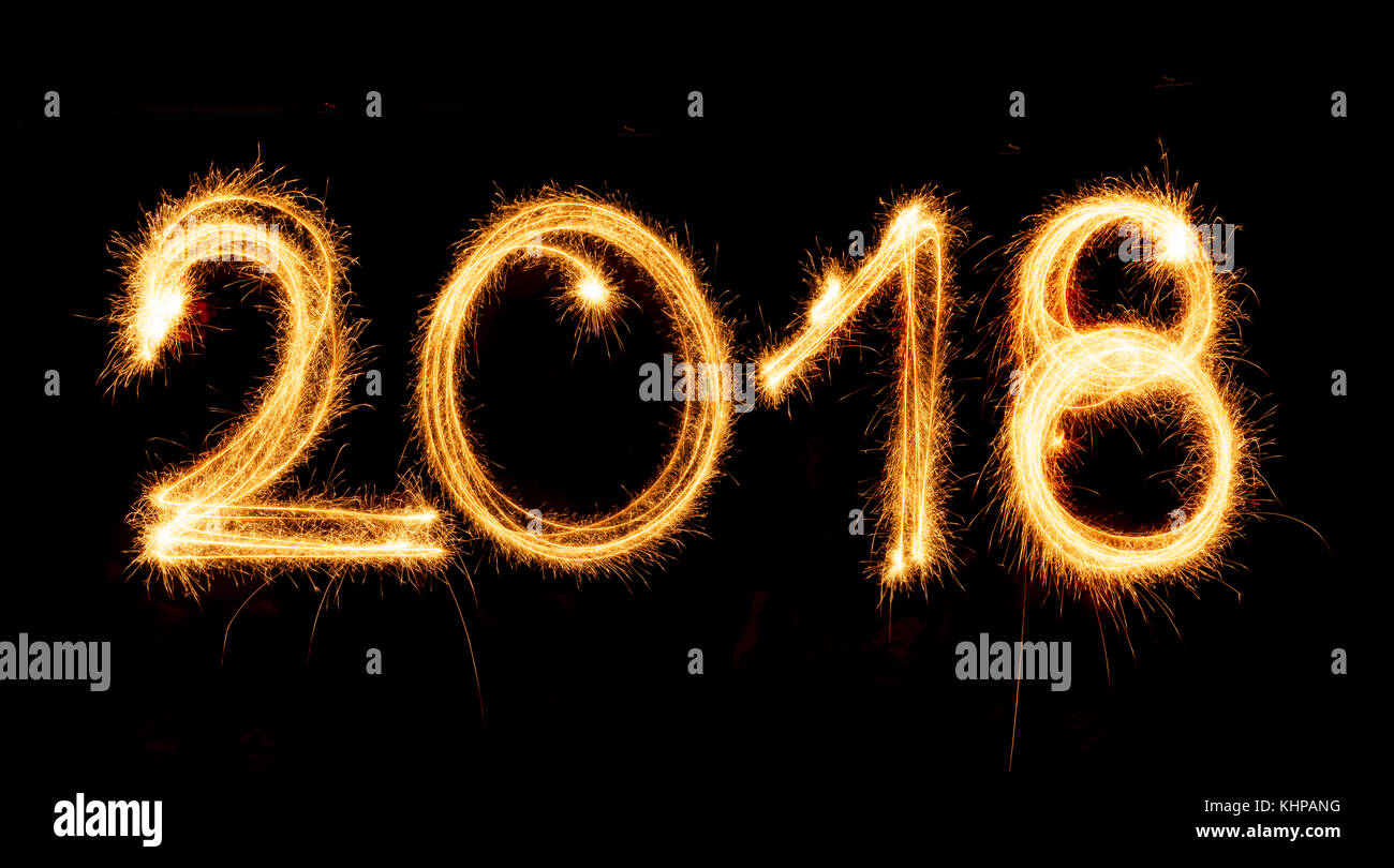 Bonne Année 2018 - avec des cierges sur fond noir Banque D'Images