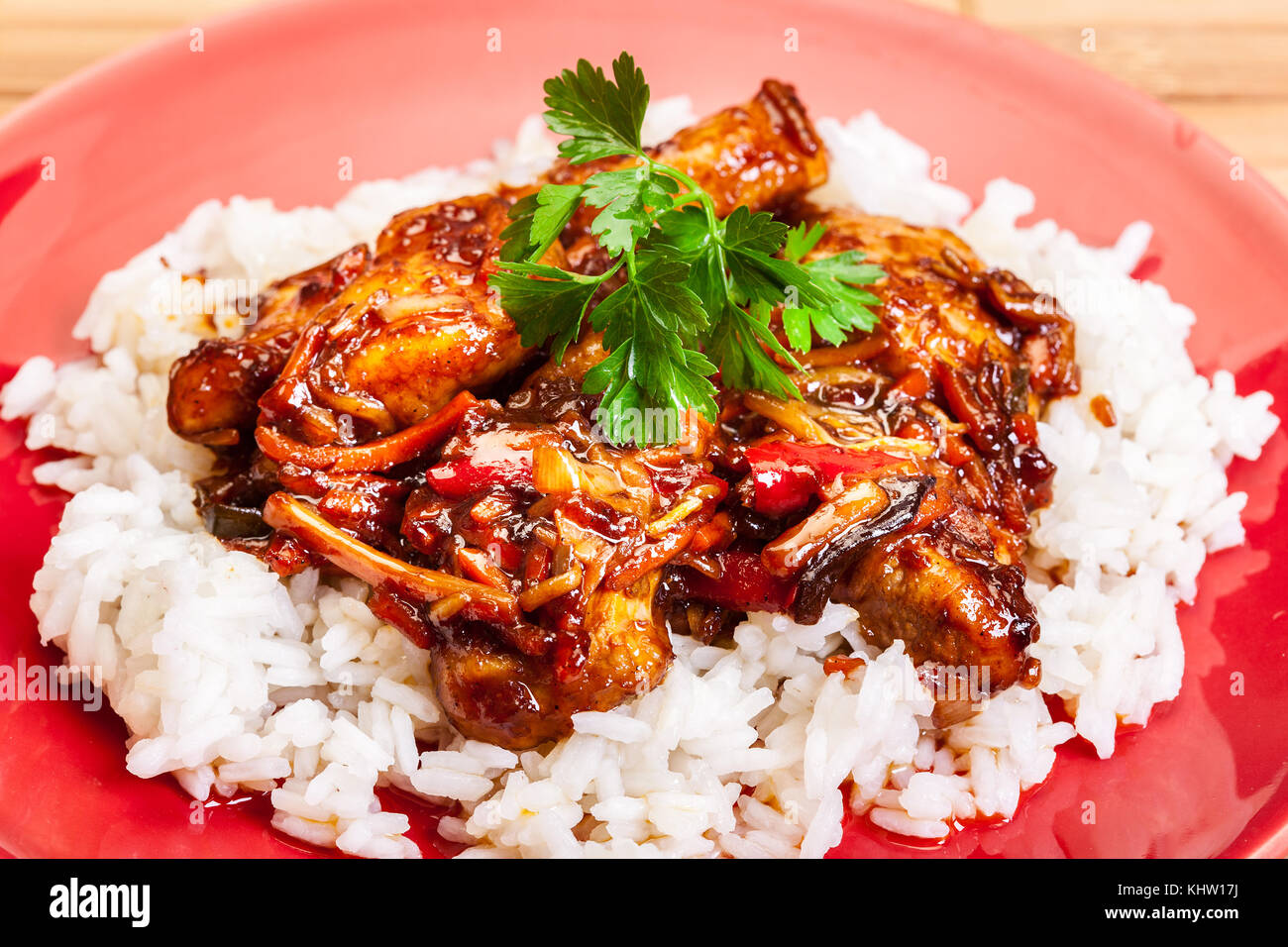 Rôti de surlonge de porc collant chinois avec une sauce sucré et salé servi avec riz bouilli Banque D'Images