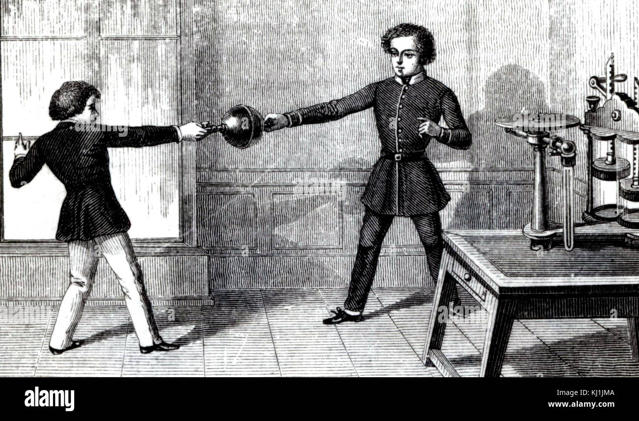 Gravure représentant deux garçons essayant de séparer deux hémisphères de Magdebourg. Les hémisphères de Magdebourg sont une paire de cuivre avec de grands hémisphères, les jantes. Ils ont été utilisés pour démontrer la puissance de la pression atmosphérique. Quand les bords ont été scellés avec de la graisse et l'air était pompée, la sphère contenait un vide et ne pouvait pas être arraché par des équipes de chevaux. En date du 19e siècle Banque D'Images