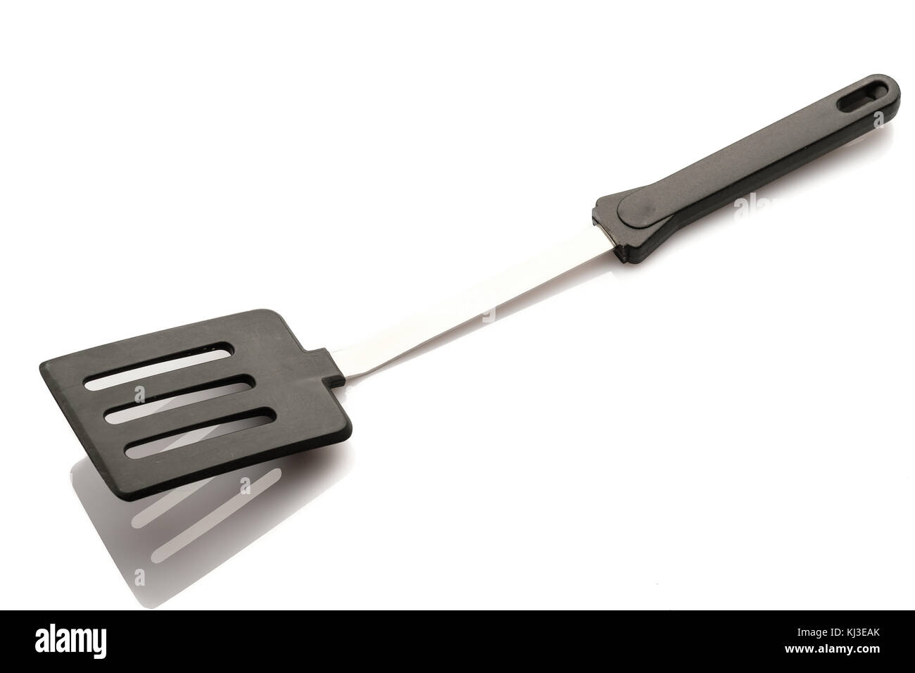 Racloir Pan et la spatule avec poignée en plastique isolé blanc Banque D'Images