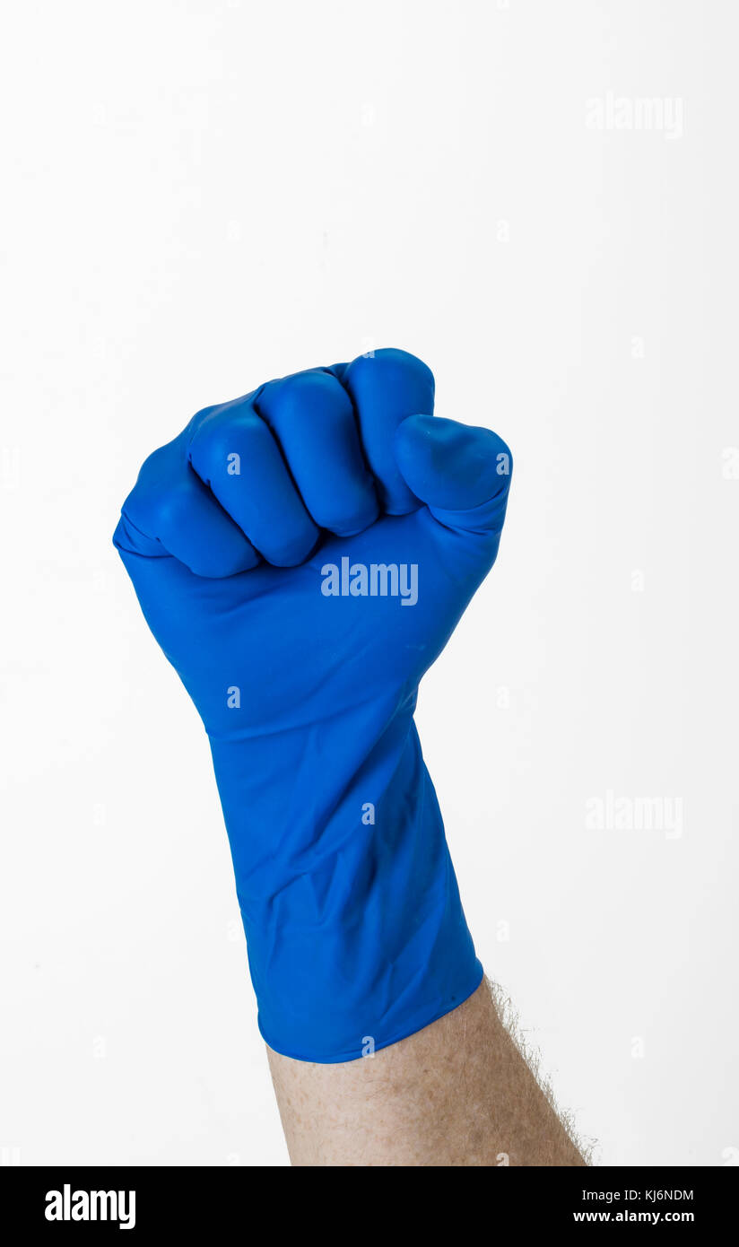 Gant bleu main gantée faisant Fist Banque D'Images