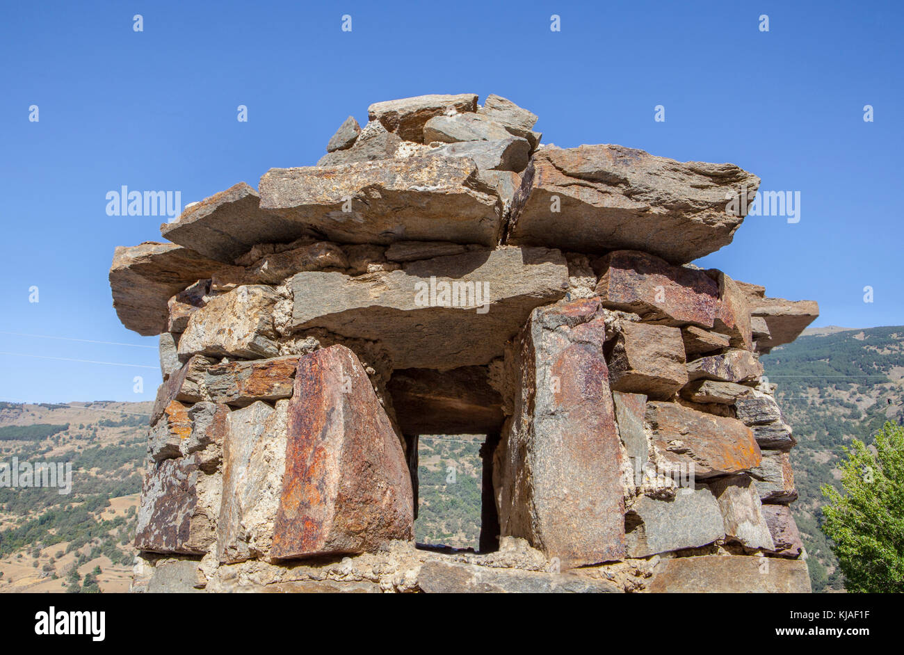 Chapeau à cheminée traditionnelle forme Poqueira Gorge Cottage. Las Alpujarras Région, Granada, Espagne Banque D'Images