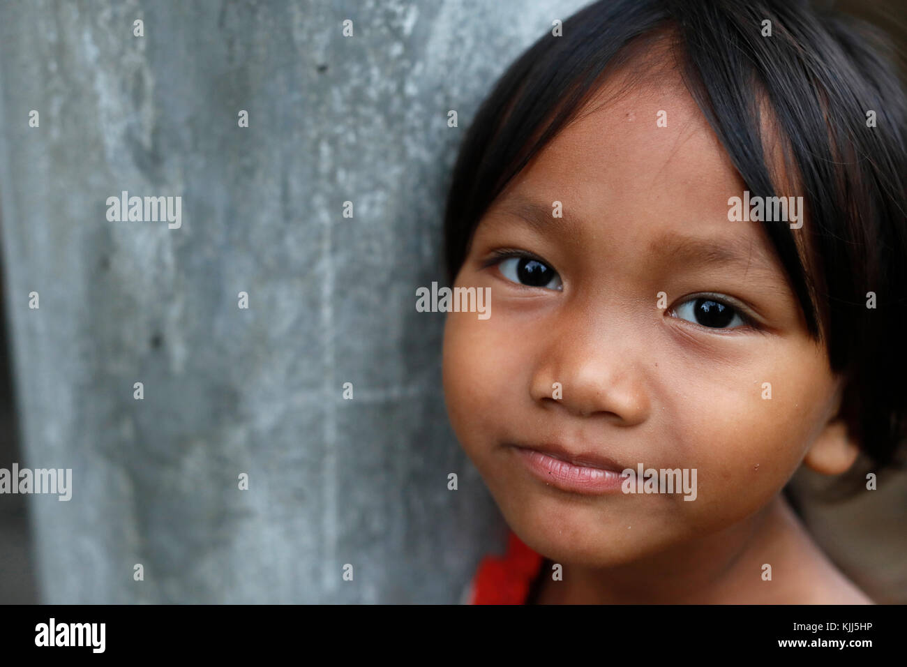 Ba Na (Bahnar) groupe ethnique. Jeune fille. Portrait. Kon Tum. Le Vietnam. Banque D'Images