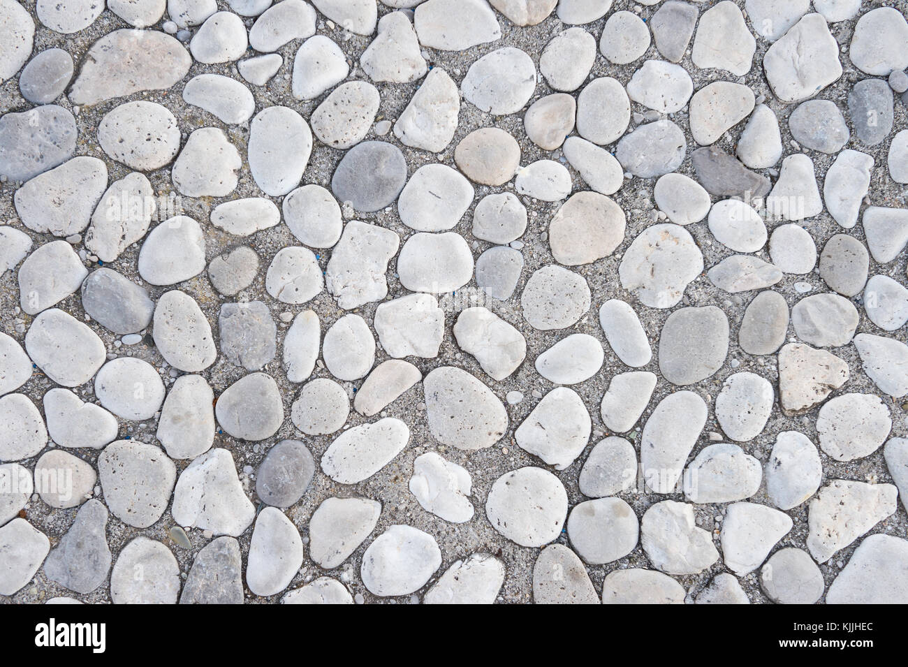 Pebble stone gris texturé abstract background Banque D'Images