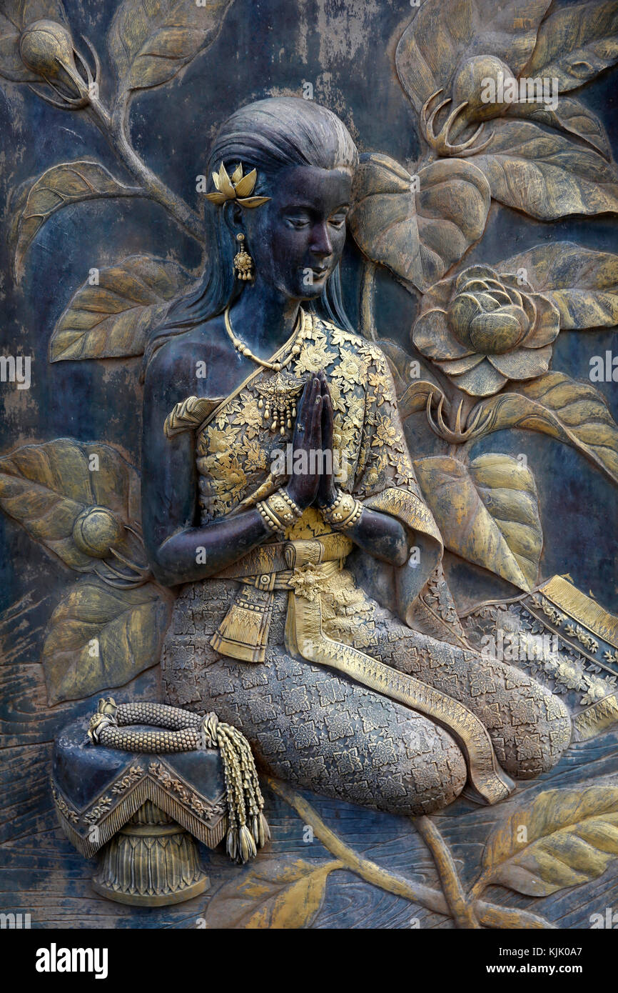 Soulagement dans Wat Khao Takiab, Hua Hin. La Thaïlande. Banque D'Images