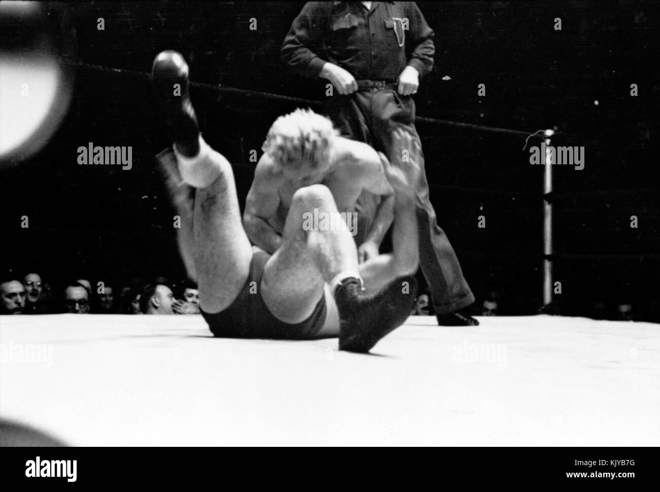 Gorgeous George essayant de borne cph.3d03890 Banque D'Images