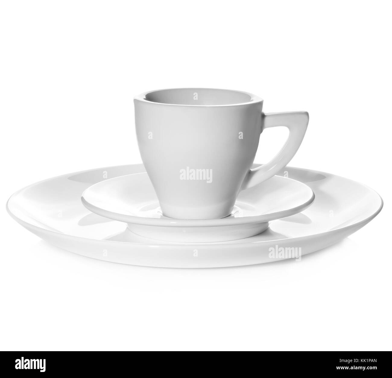 Un ensemble de vaisselle blanche, deux plaques et une tasse Banque D'Images Un ensemble de vaisselle blanche, deux plaques et une tasse Banque D'Images