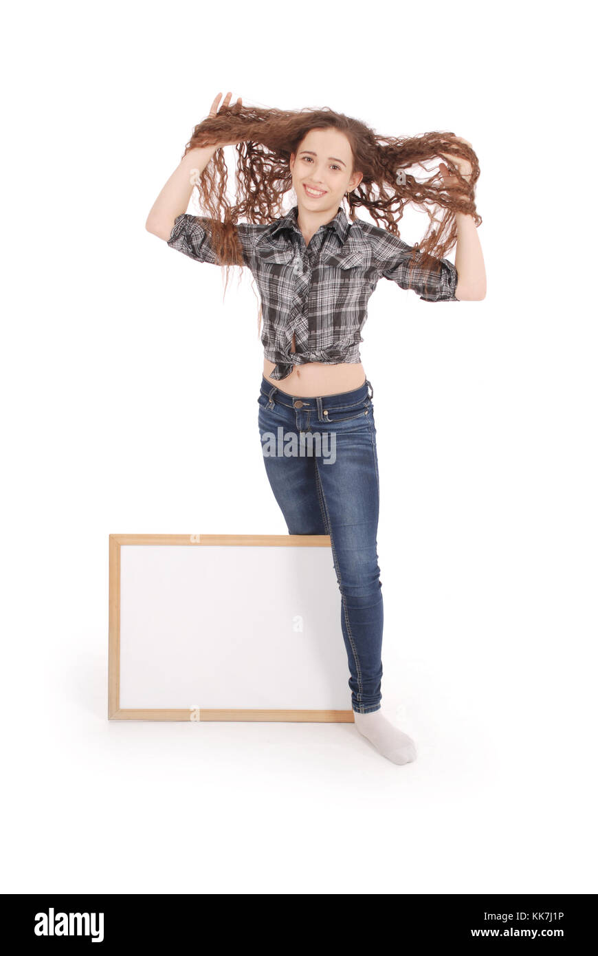 Jeune fille avec photo frame isolated on white Banque D'Images