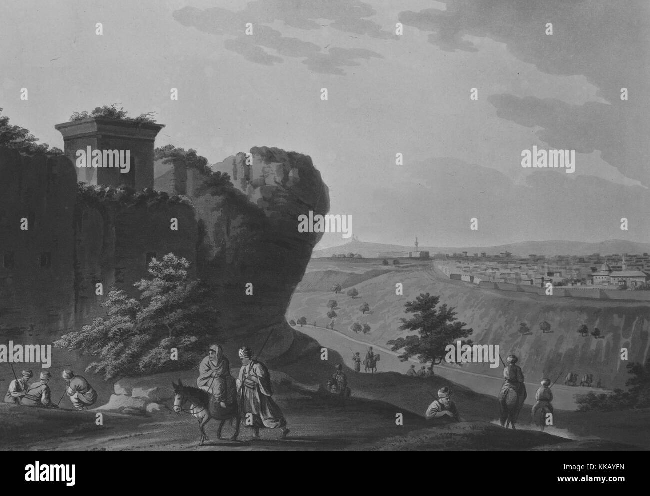 Une gravure en couleur montrant un paysage palestinien, une femme monte sur le dos d'un âne tandis qu'un homme marche à côté d'elle, d'autres hommes sont des ânes circonscription dans l'arrière-plan tandis que d'autres sont assis ou en marchant, un tombeau en pierre se trouve au sommet d'une falaise court, une grande ville peut être vu dans l'arrière-plan au-delà d'une vallée qui a une route coupant à travers elle, de la Palestine, 1804. À partir de la Bibliothèque publique de New York. Banque D'Images