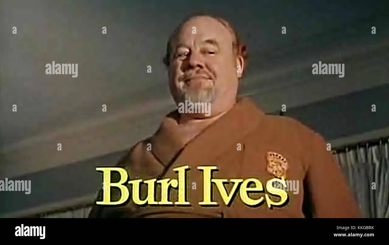 Une image promotionnelle du film de 1958 « Cat on a Hot Tin Roof », mettant en vedette Elizabeth Taylor et Paul Newman, capturant un moment dramatique entre les personnages principaux dans un décor gothique du Sud. Banque D'Images