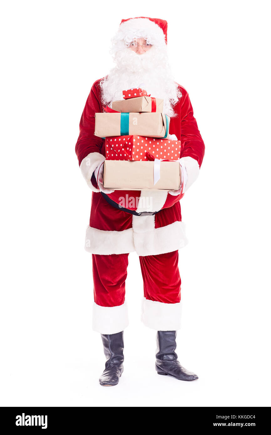Père Noël avec des tas de cadeaux Banque D'Images
