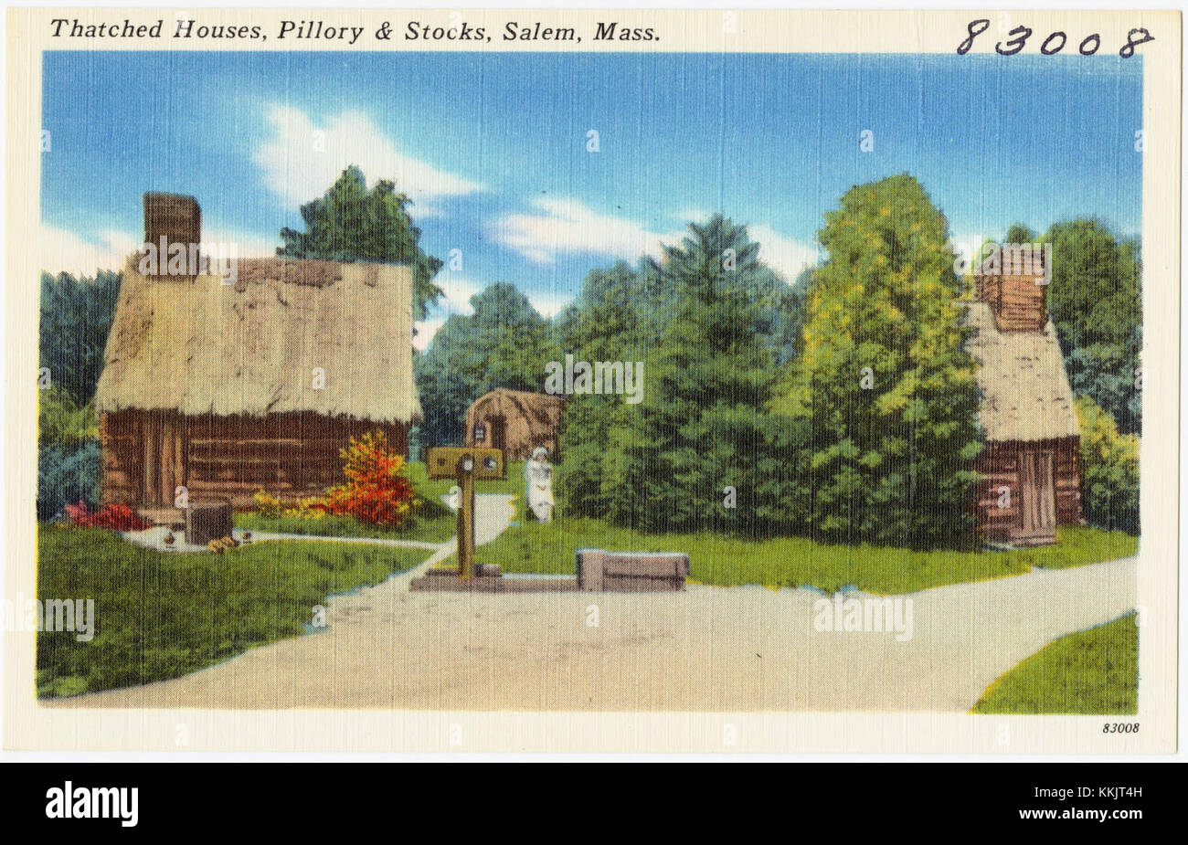 Une scène historique de maisons de chaume, pilori et stocks à Salem, Massachusetts. Cette image capture un aspect colonial précoce de la vie américaine, reflétant l'histoire de la ville. Banque D'Images