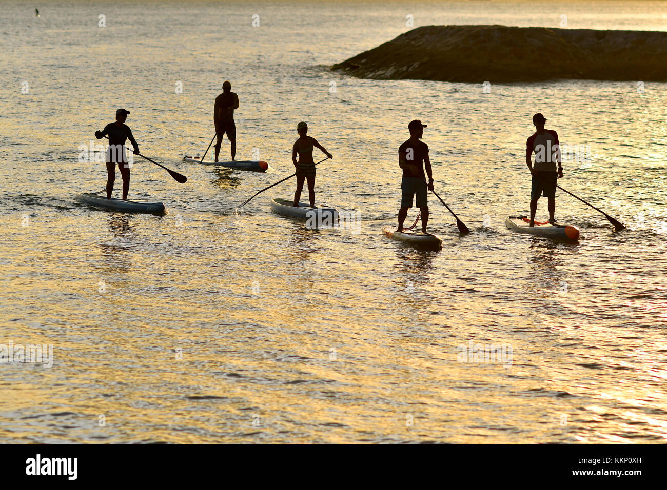 Le Stand Up Paddle Surf et Stand Up Paddle (SUP) Banque D'Images