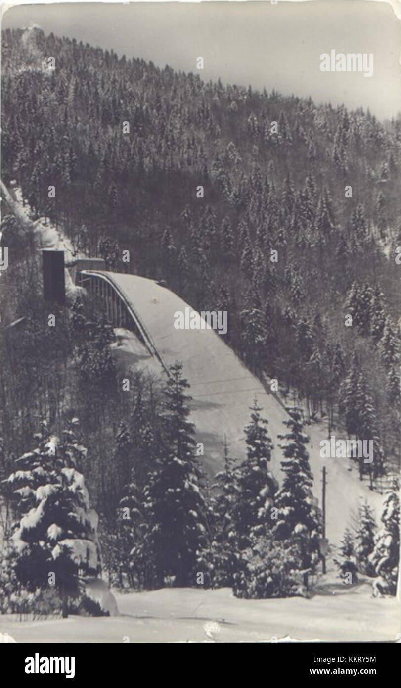 Cette carte postale de Planica, Slovénie, datée de 1963, capture une vue panoramique de la région. Planica est connue pour sa colline de saut à ski et est une destination populaire pour les sports d'hiver et le tourisme. Banque D'Images
