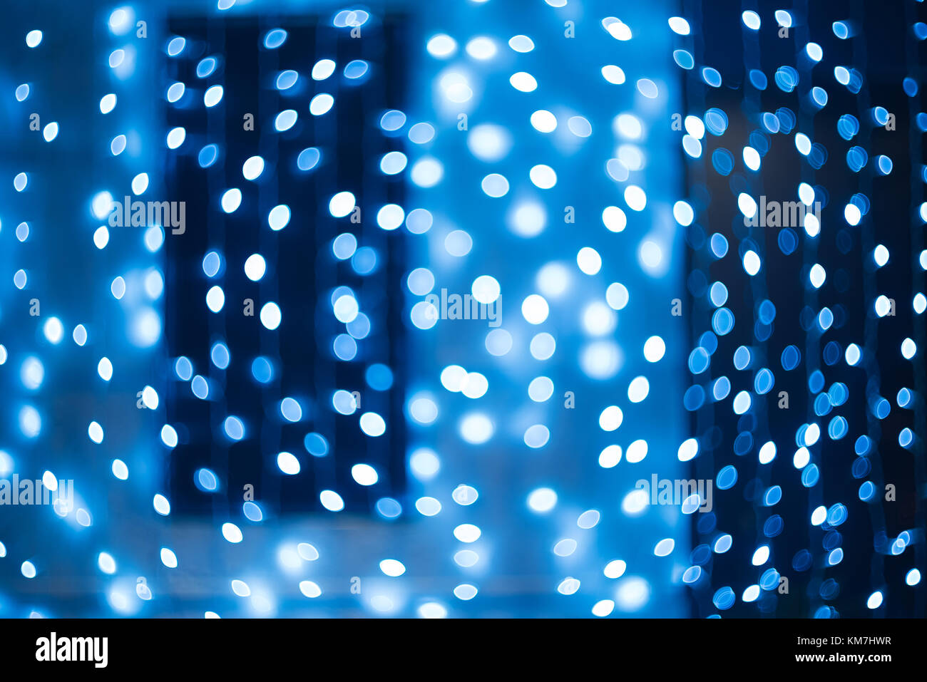 Bokeh. Nouvelle Année d'arrière-plan flou. Résumé fond de Noël avec des lumières de flou artistique flou pour maison de design. Concept. Garland floue Banque D'Images