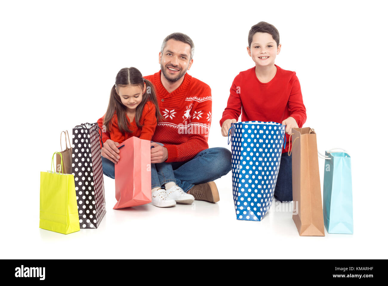 Family with shopping bags Banque D'Images
