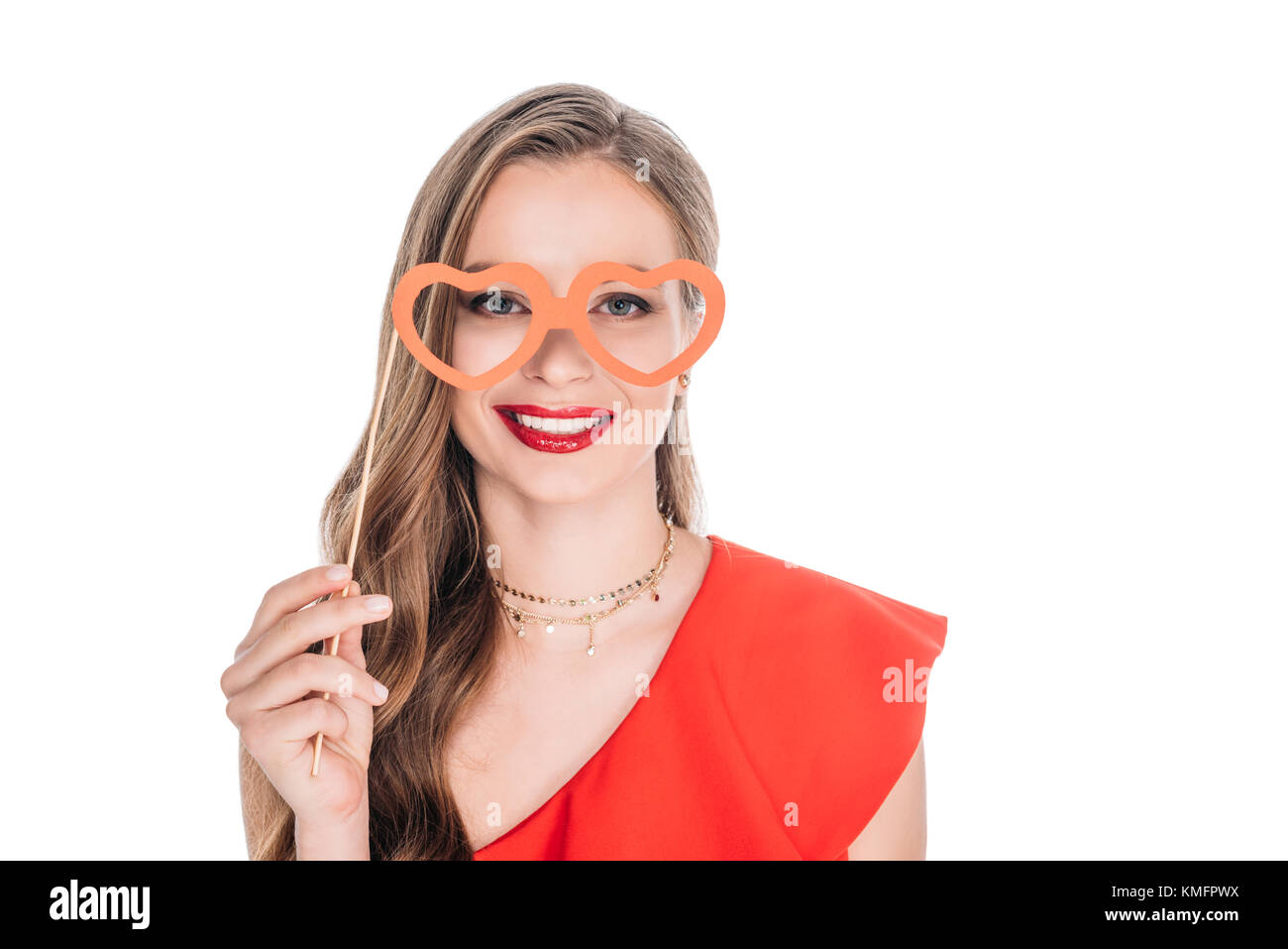 Fille avec des lunettes en forme de coeur sur stick Banque D'Images