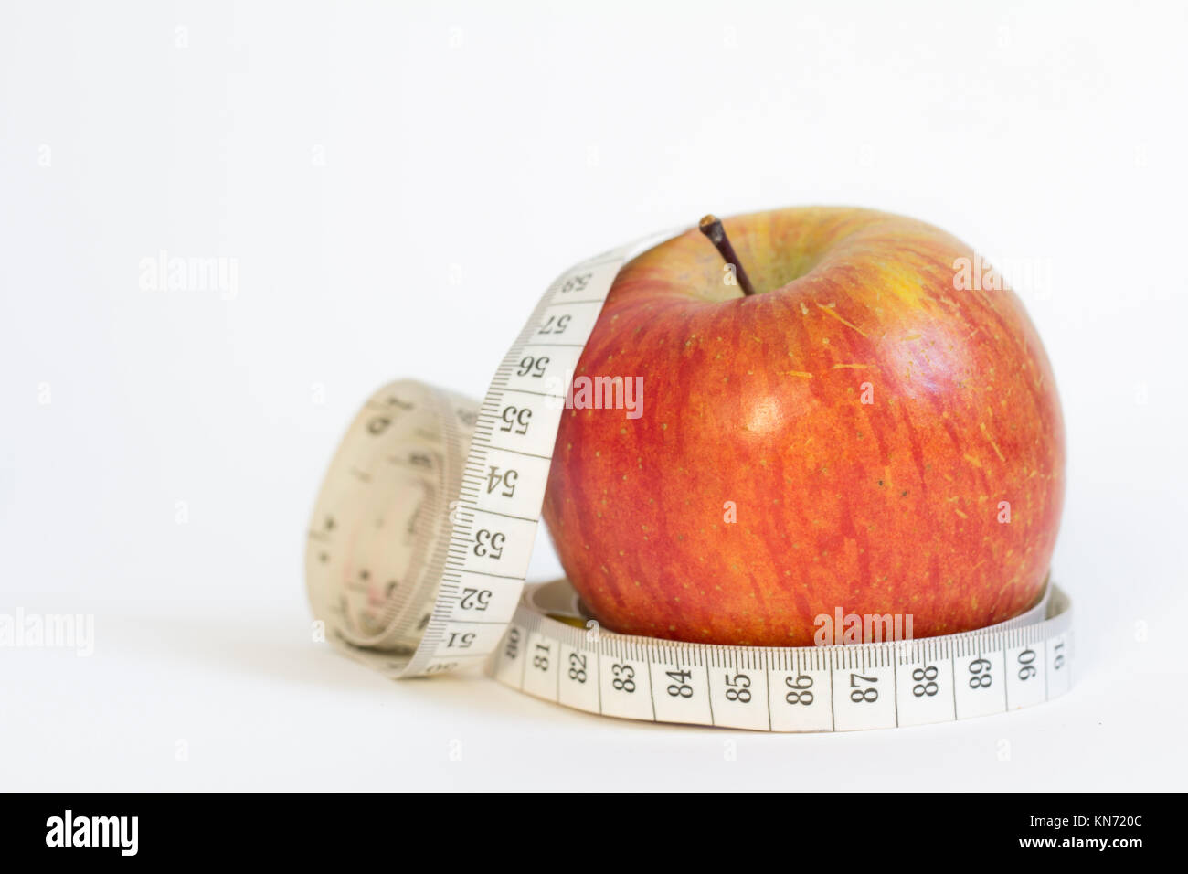 Apple et ruban à mesurer Banque D'Images