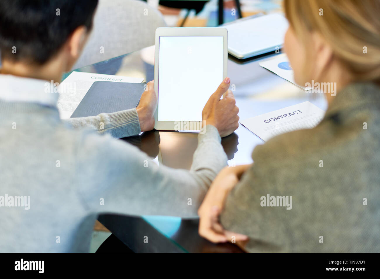 Businesswoman Using Digital Tablet in Meeting Banque D'Images