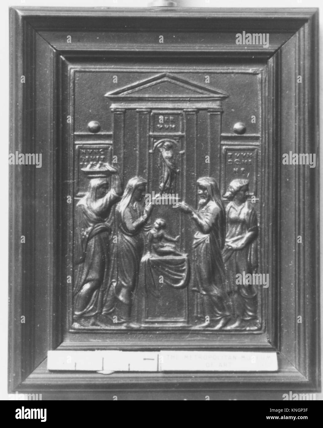 Cette œuvre illustre l'Adoration des Mages, montrant les trois sages présentant des dons au Christ nouveau-né, reflétant l'iconographie chrétienne et les traditions de la Nativité. Banque D'Images