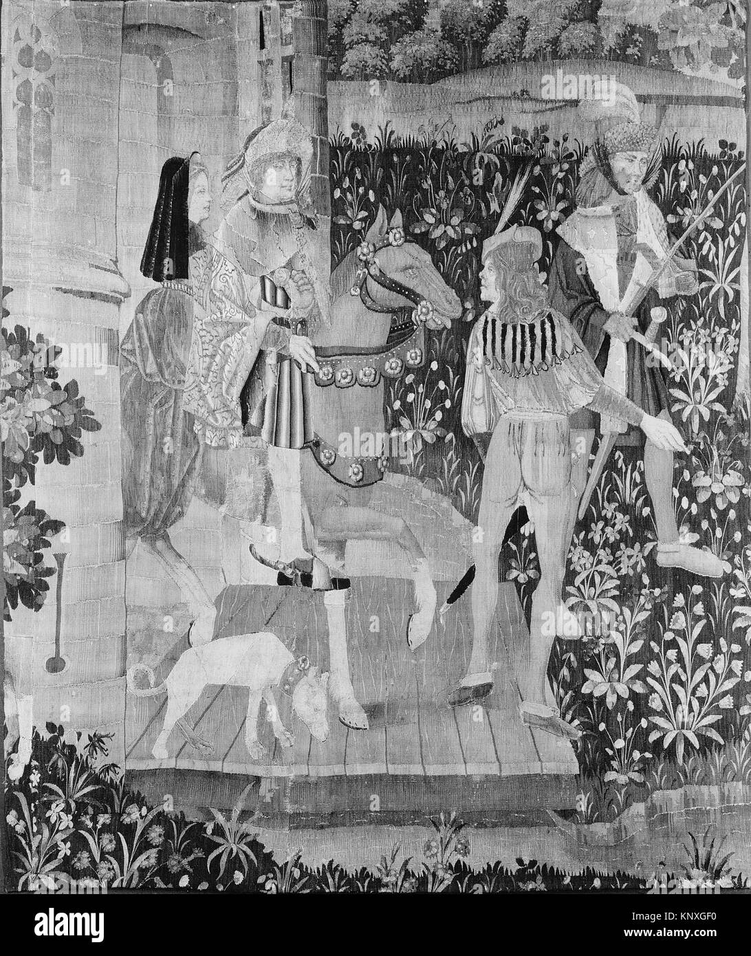 Cette peinture représente un groupe de chasse sud-néerlandais partant d'un château, fabriqué en laine vers 1495-1515. Banque D'Images