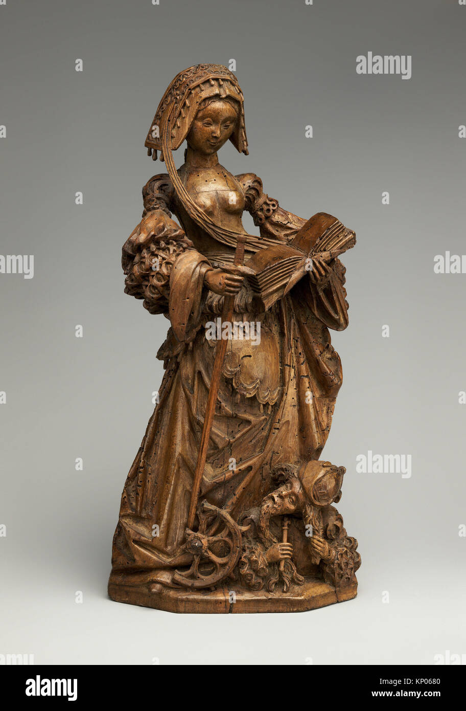 Sainte Catherine d'Alexandrie. Date : ca. 1530 ; Culture : allemand ; moyen  : Noyer ; Dimensions : hors tout : 14 x 15/16 x 5 3/16 7 1/4 in. (38 x 18,3  x 13,3 Photo Stock - Alamy
