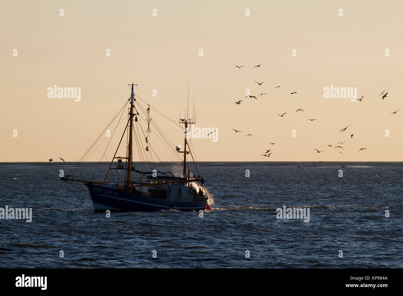 Letztes Licht am Meer, warme und Sonnenstrahlen Wellen am Meer, Wattenmeer oder das Licht bei wenig Wasser Banque D'Images