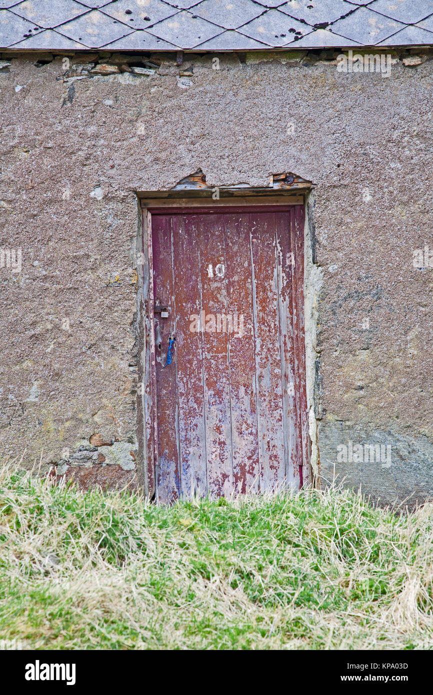 Porte à 10 le nombre de chalets abandonnés, Marbhig, Isle Of Lewis, Hébrides extérieures. Banque D'Images