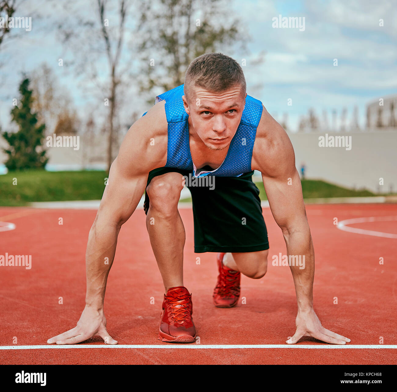 L'homme au début du tapis roulant Banque D'Images