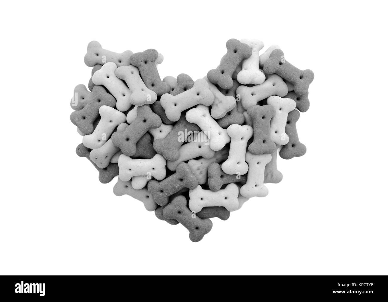 Les biscuits pour chiens en mixte forme de coeur Banque D'Images