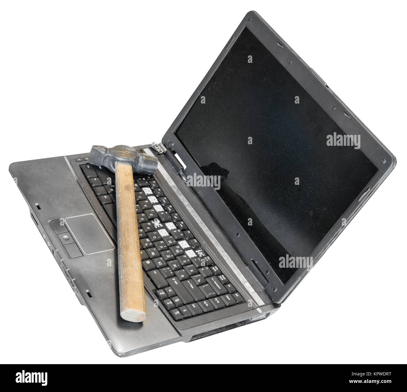 Ancien ordinateur portable défectueux avec un marteau sur le clavier Photo  Stock - Alamy