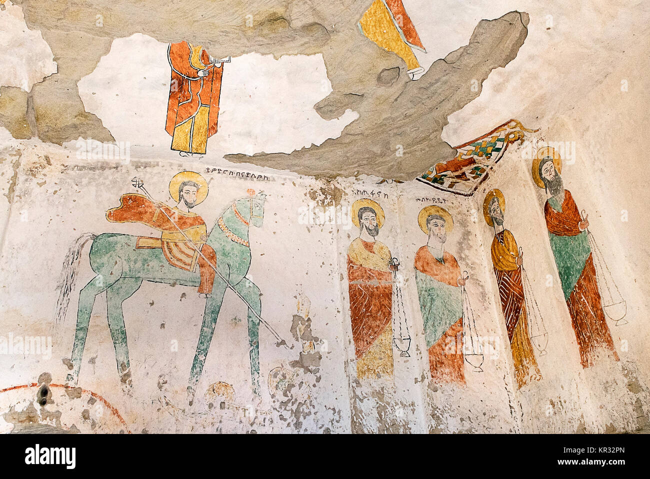 Saint Théodore le Oriental (Banadlewos) sur un cheval, à sa droite et Stephen King et Melchisédek, prêtre de l'église rupestres Daniel Qorqor, Ethiopie Banque D'Images