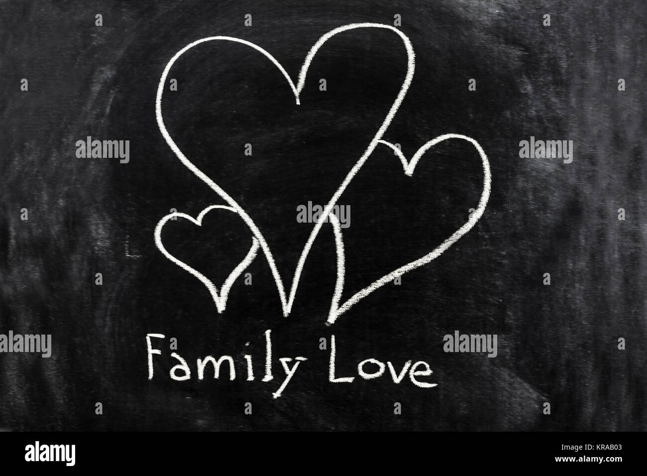 Famille amour dessiné sur le tableau noir Banque D'Images