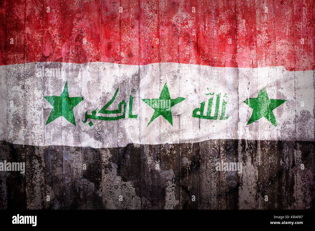 Grunge style de l'Irak drapeau sur un mur de brique pour le fond Banque D'Images