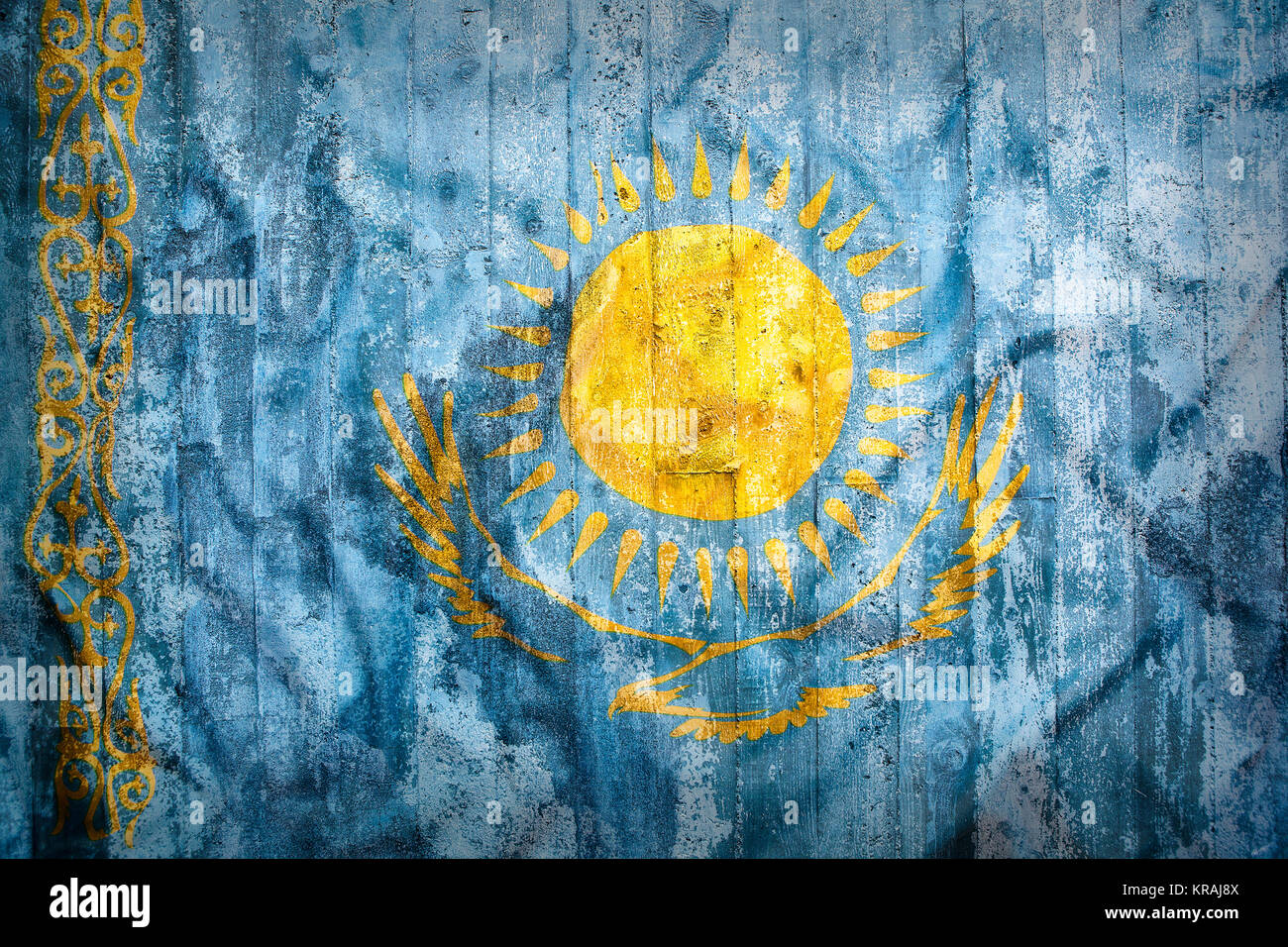 Grunge style du Kazakhstan drapeau sur un mur de brique pour le fond Banque D'Images